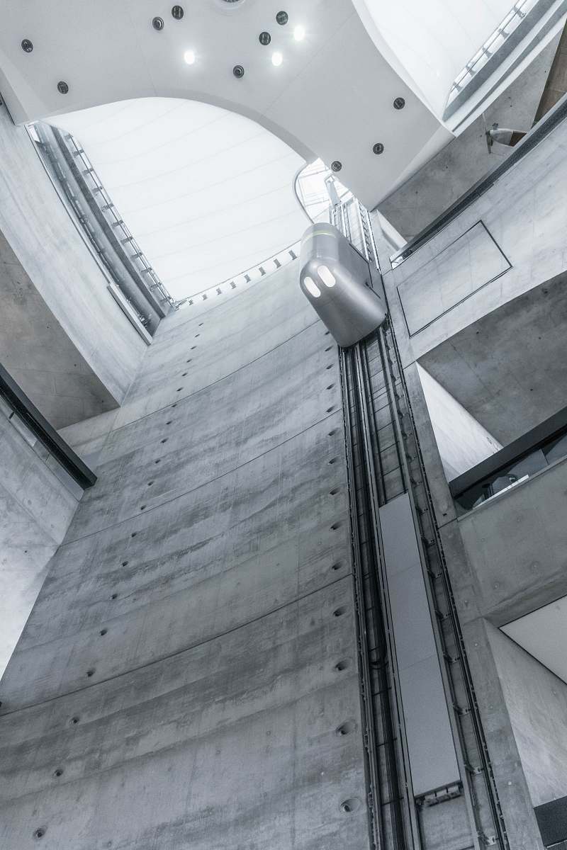 building low-angle photography of high-rise building window