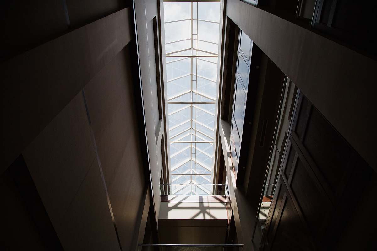 building low angle photography of inside building skylight