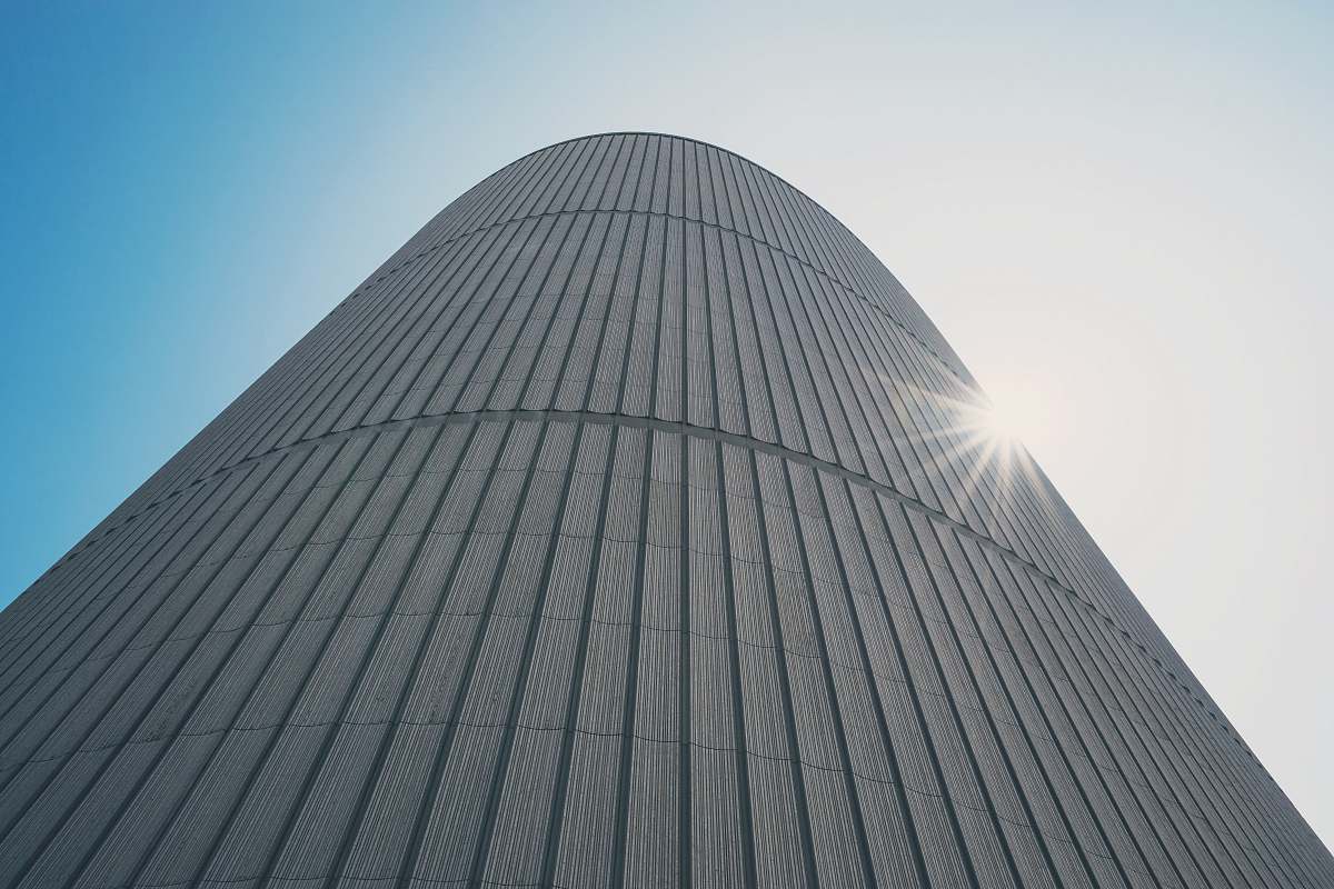 building low-angle photography of white high-rise building during daytime city