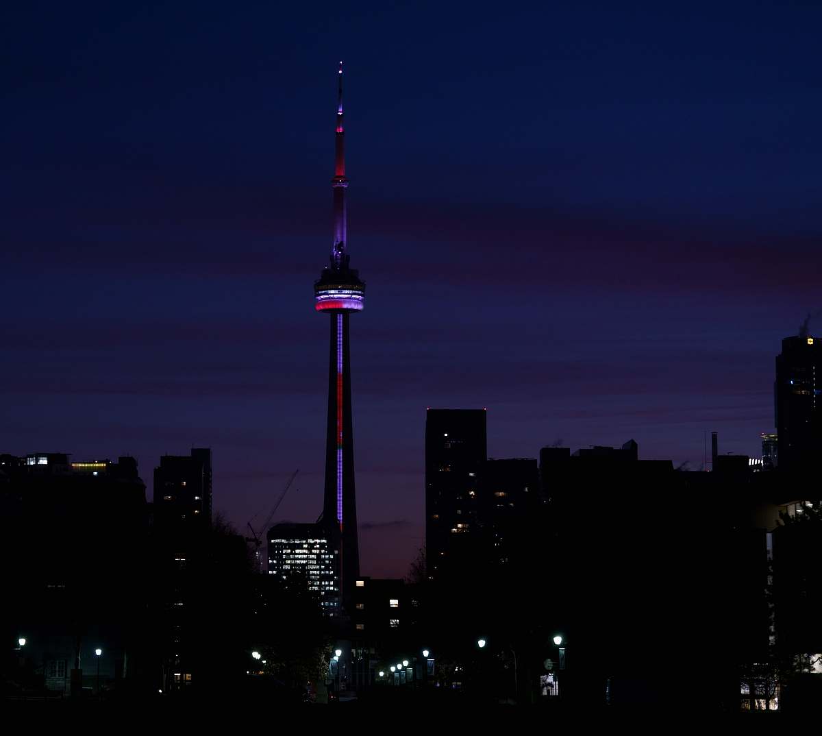 building needle tower at night spire