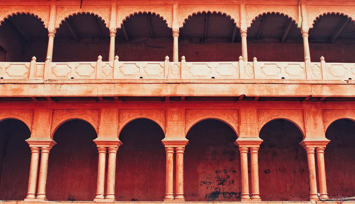 building orange concrete building with pillars india