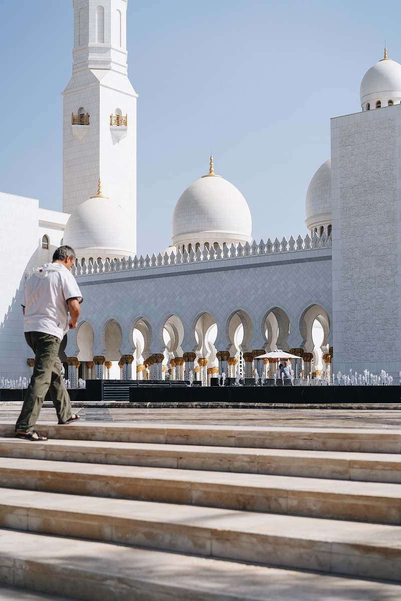 building person walking on stairs dome