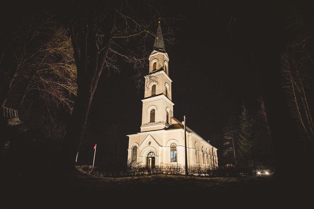 building photo of white painted cathedral tower