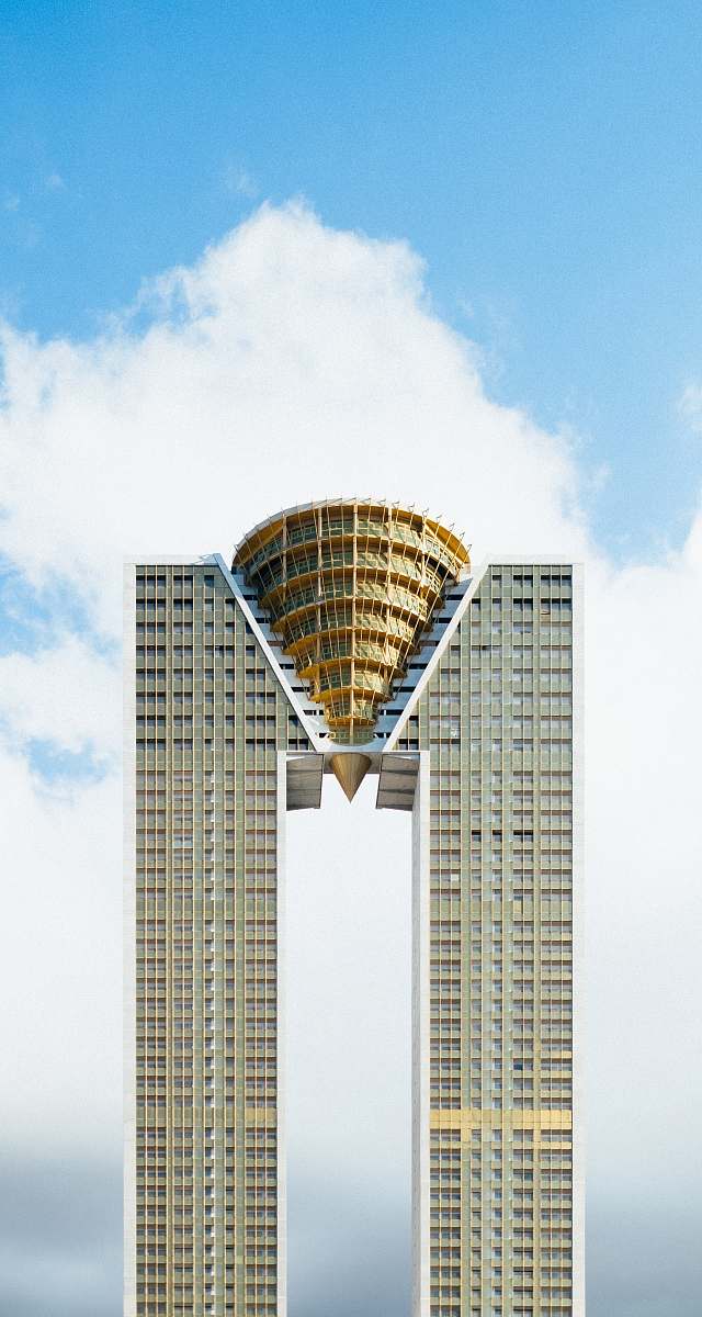 building photograph of gold and gray high rise guilding city