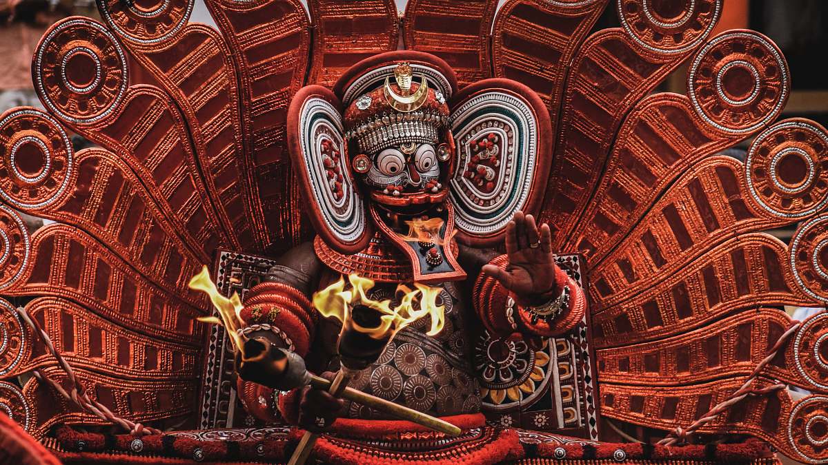 building red and white Hindu deity figurine emblem