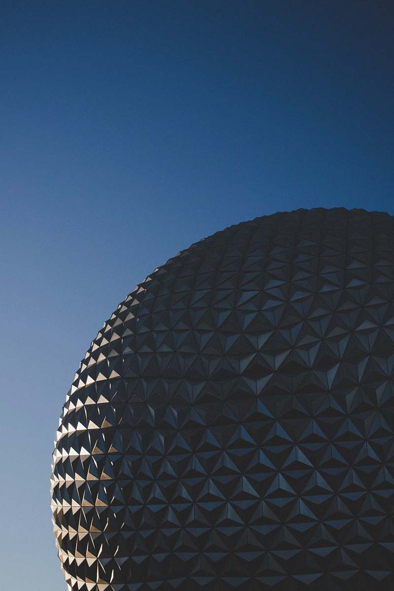 building round grey metal building during daytime dome