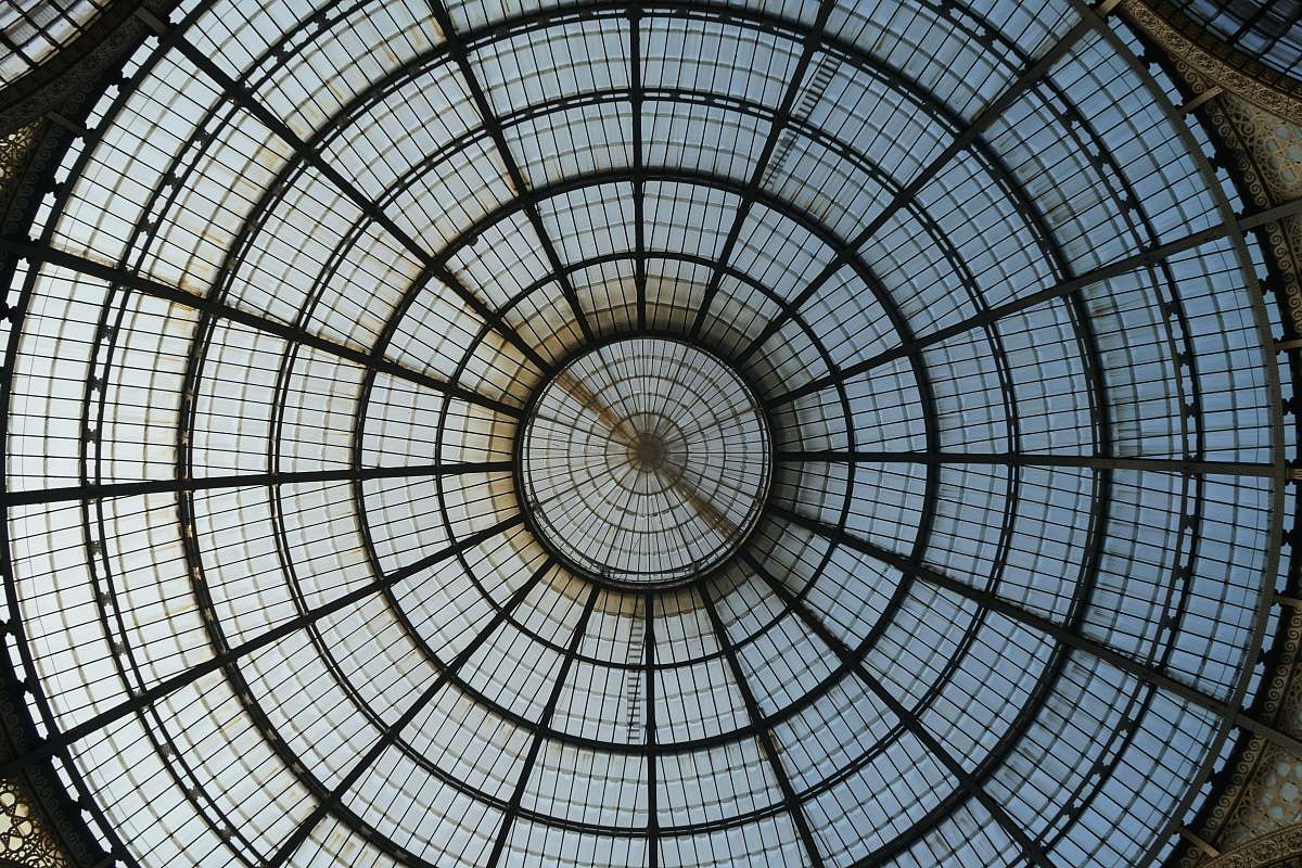 building round round white and black frame window