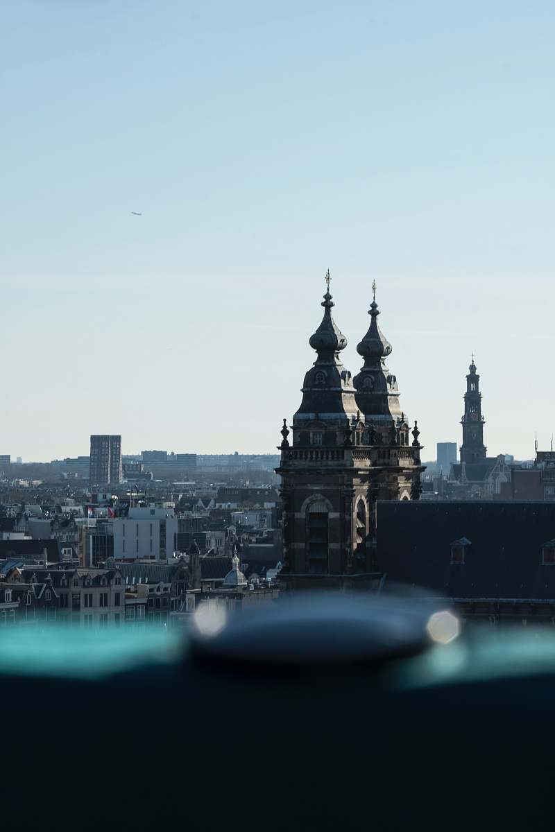 building selective-focus photograph of Gothic-style structure spire
