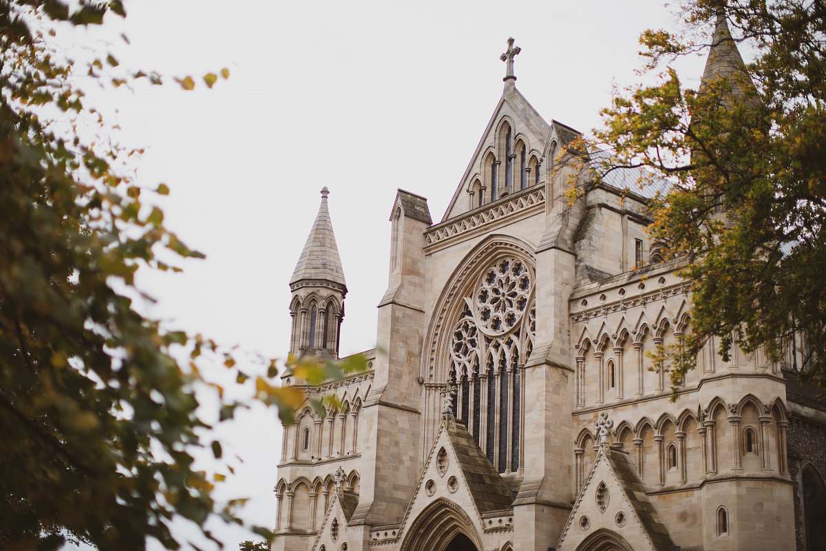 building selective focus photography of white concrete church during daytime spire