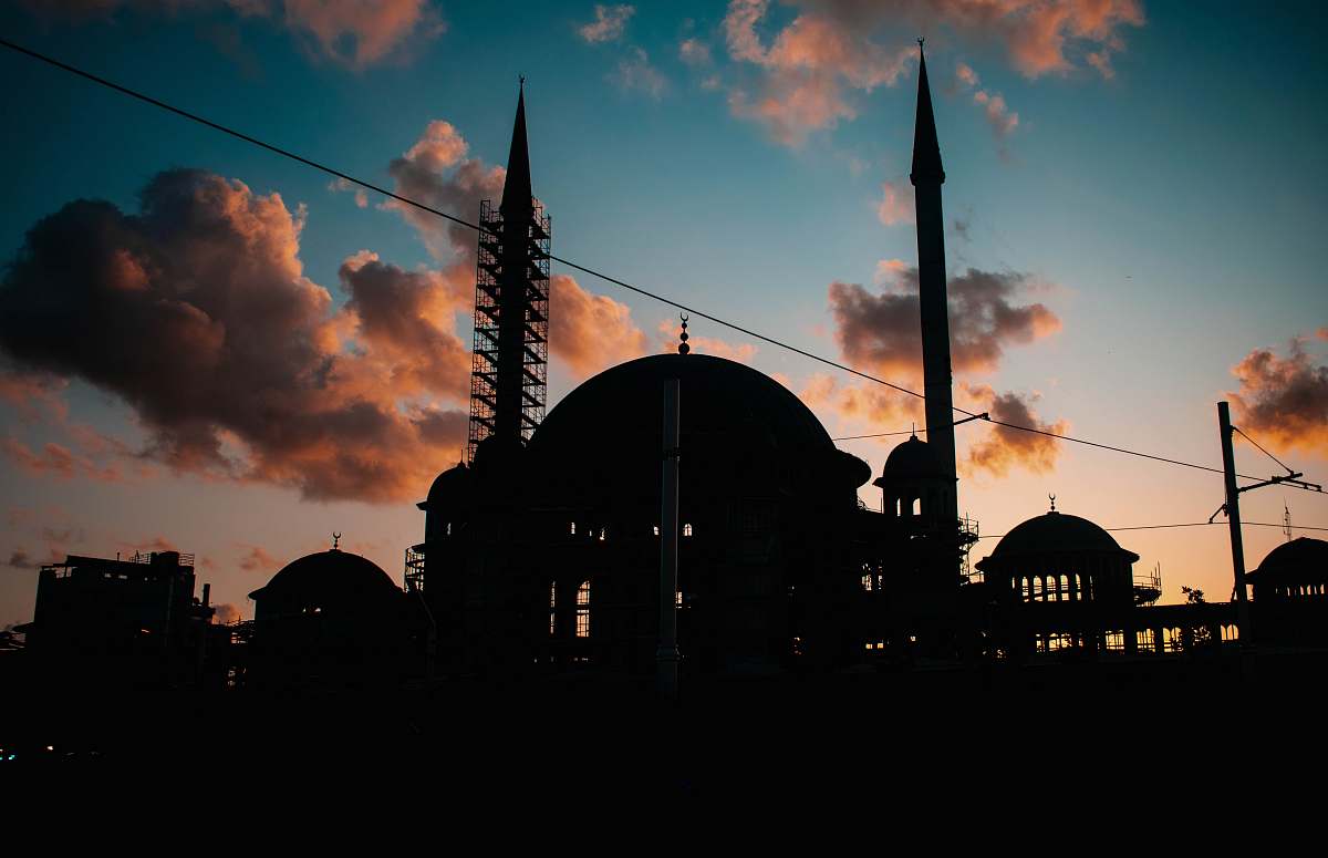 building silhouette photography of buildings under clear blue sky dome
