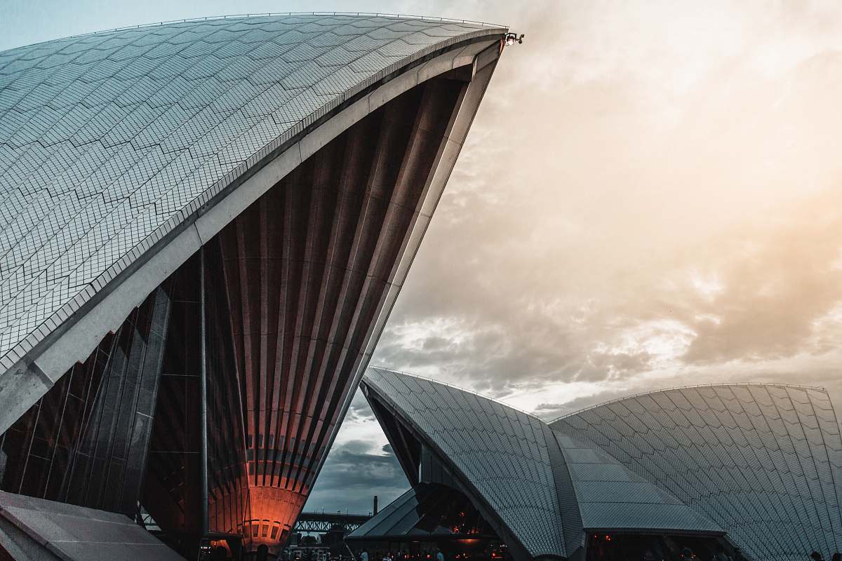 building Sydney Opera under white clouds opera house