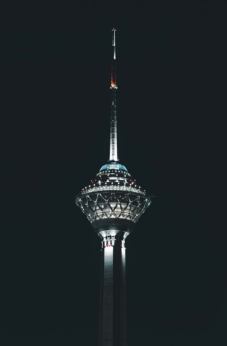 spire tower during nighttime steeple