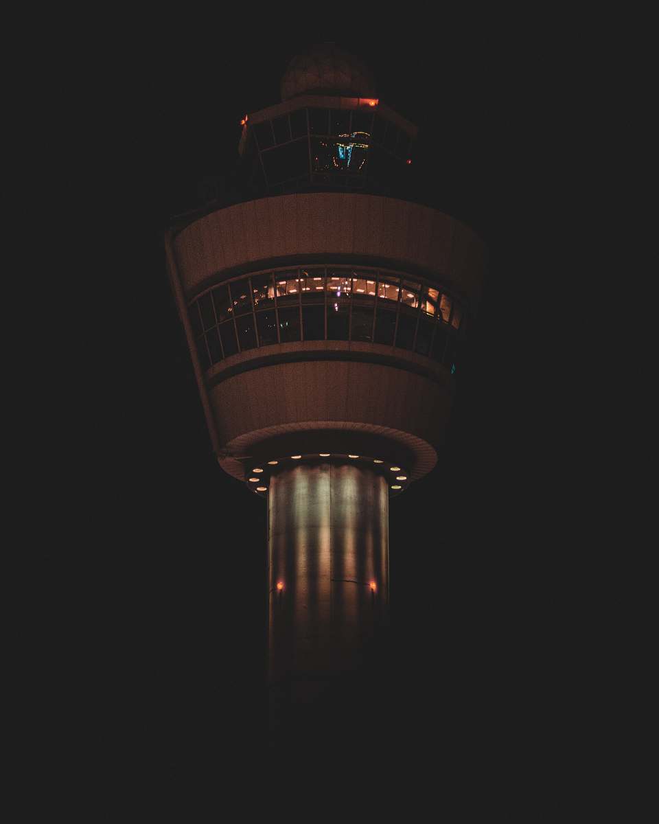 building turned-on lights on tower tower