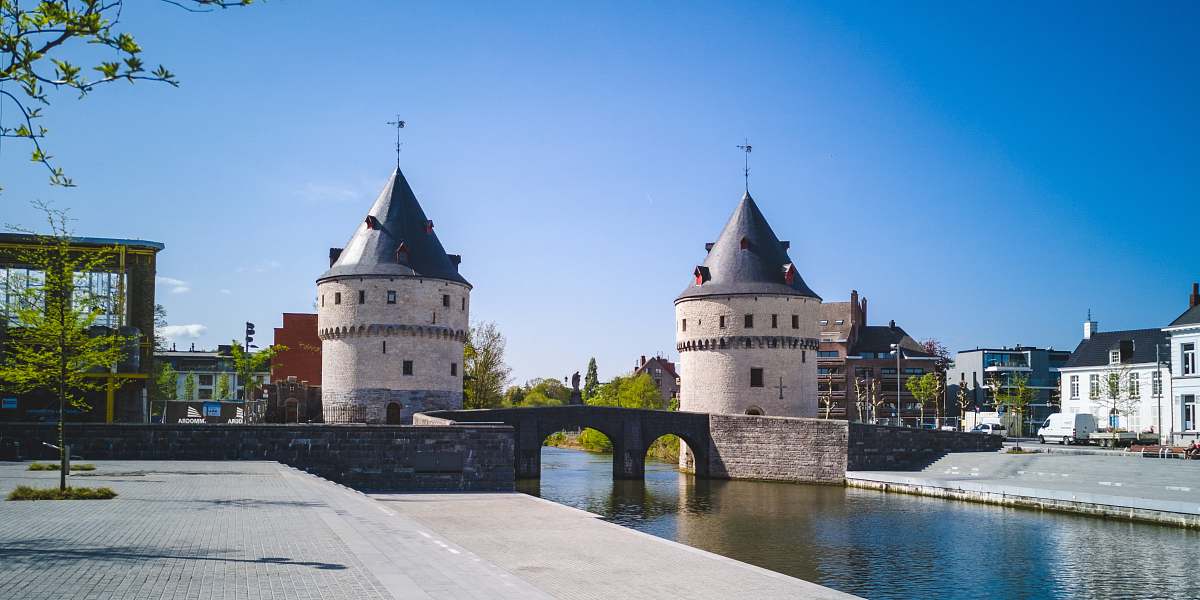 building two gray concrete castles near bridge castle
