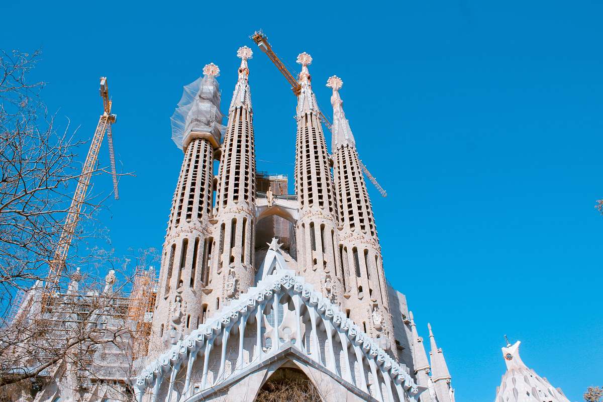 building white and beige cathedral during day spire