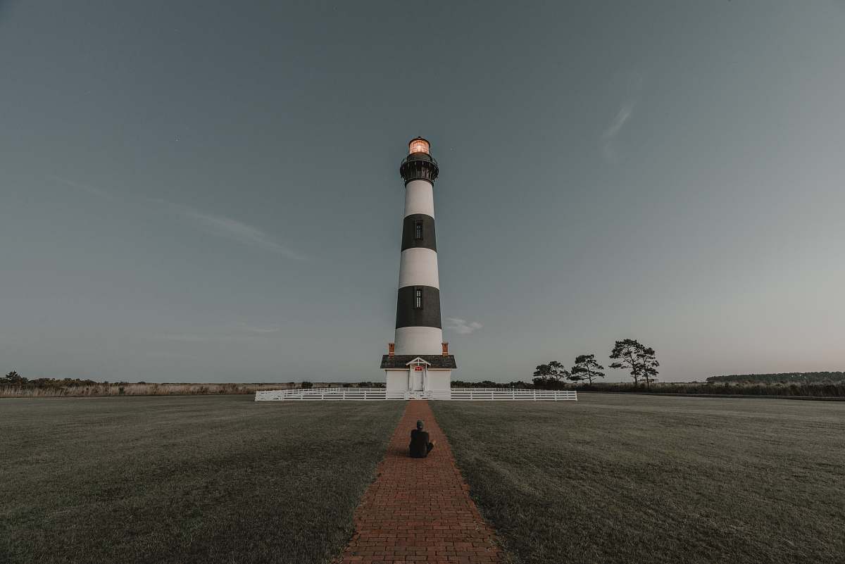 building white and black lighthouse miniature tower
