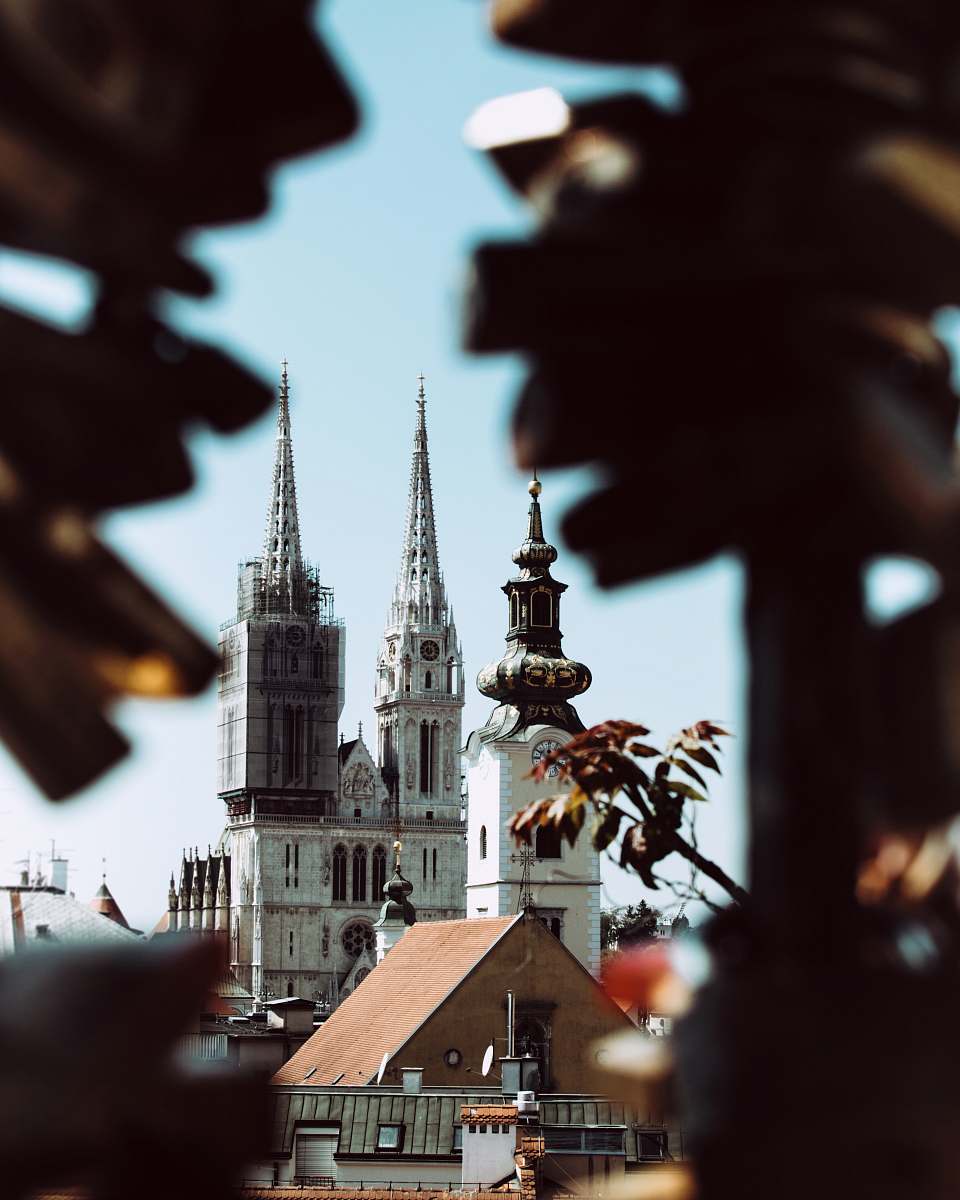 building white and brown cathedral building spire