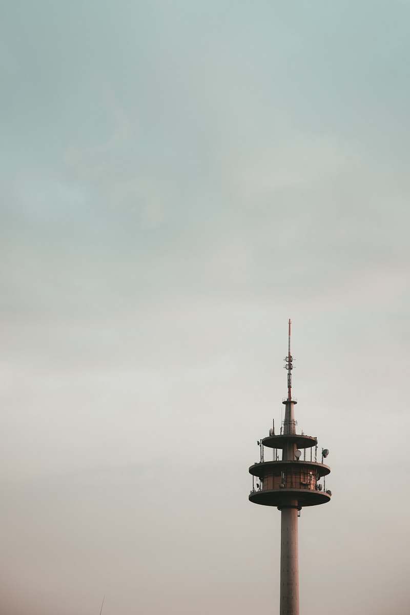 building white and brown lighthouse photograph steeple