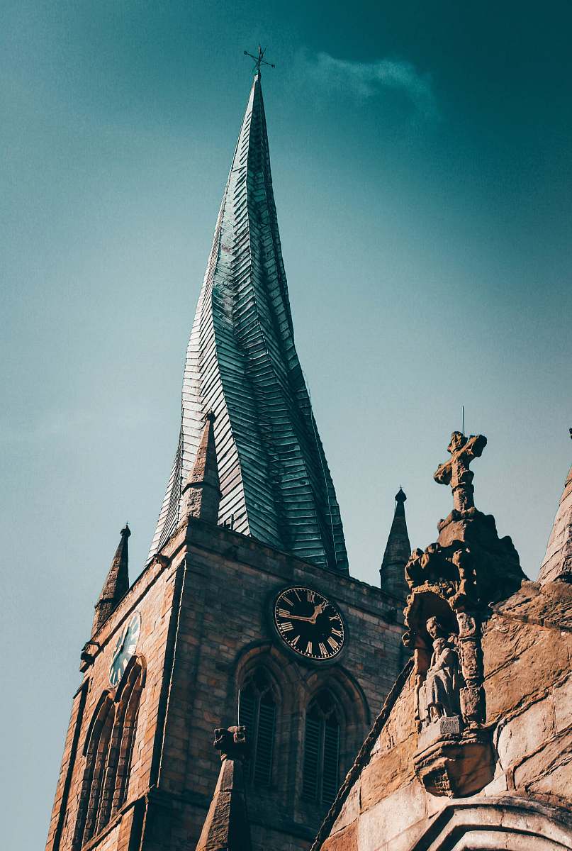 building white and brown tower spire