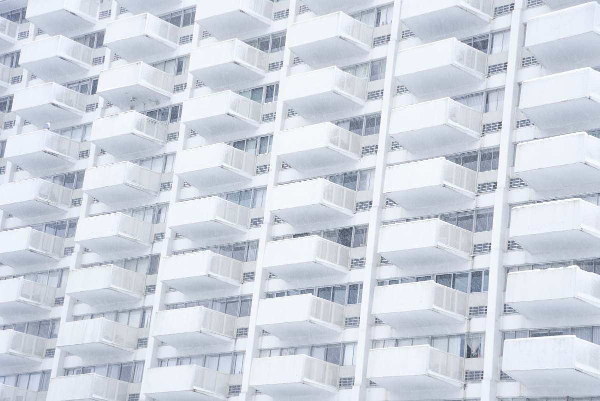 white white building facade balcony