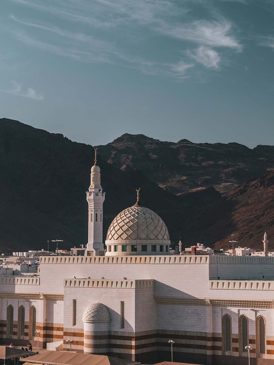 building white building near mountain during daytime dome