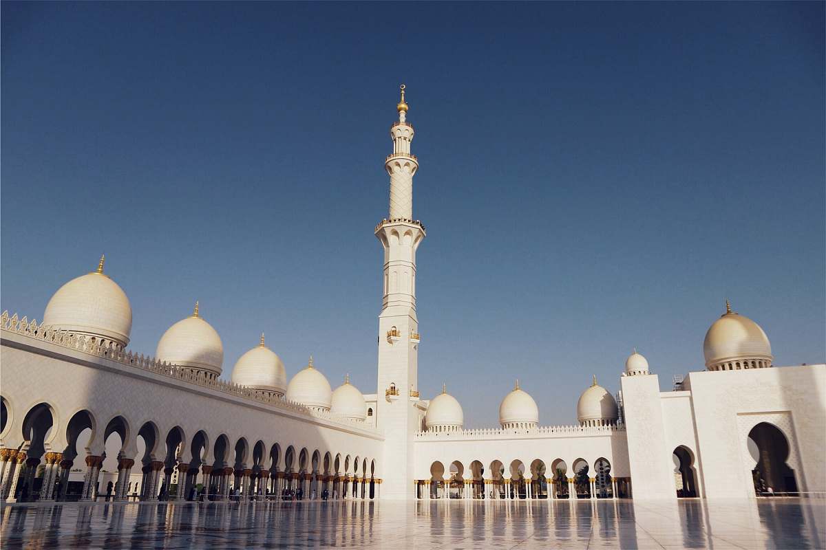 building white ceramic building under clear blue sky dome