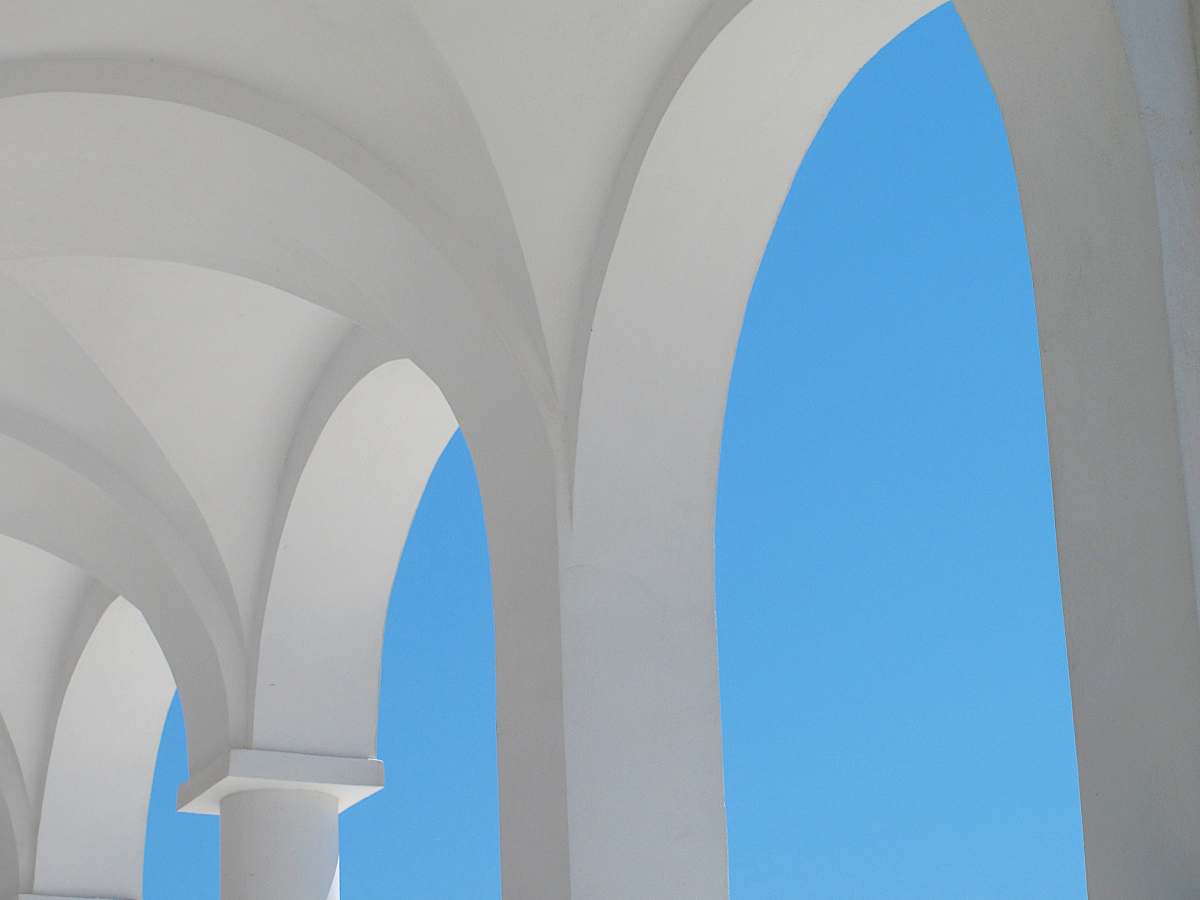 building white concrete building view arched