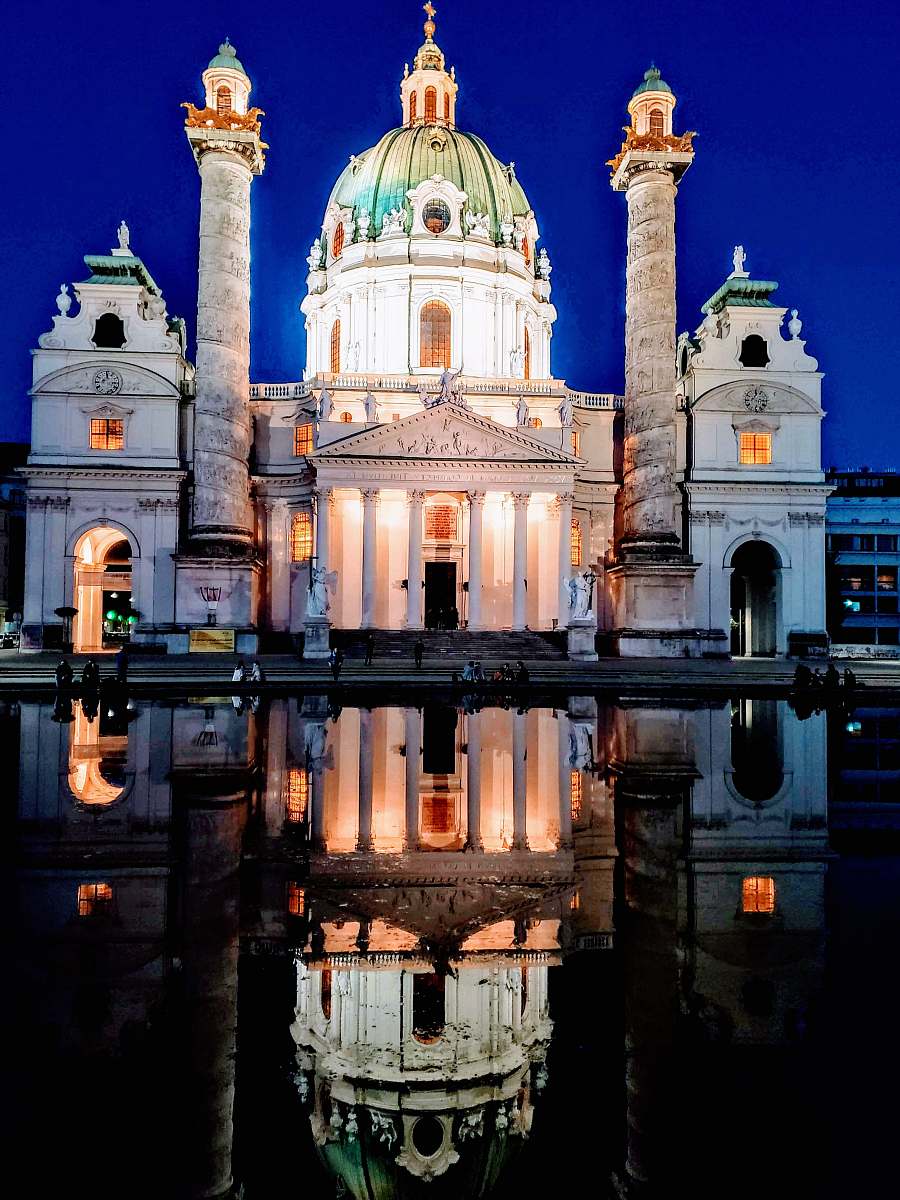 building white concrete cathedral with lights dome
