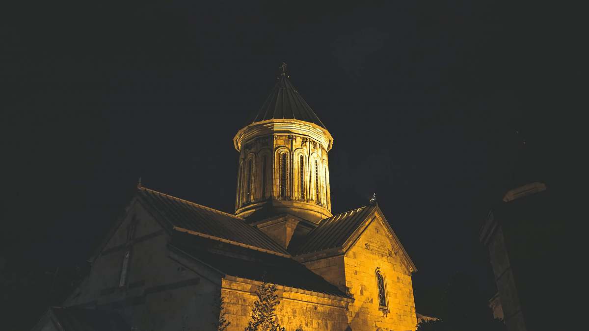 building white concrete house during nighttime dome