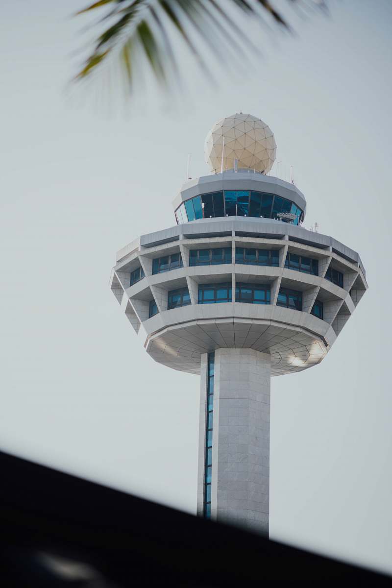 building white concrete tower during daytime tower