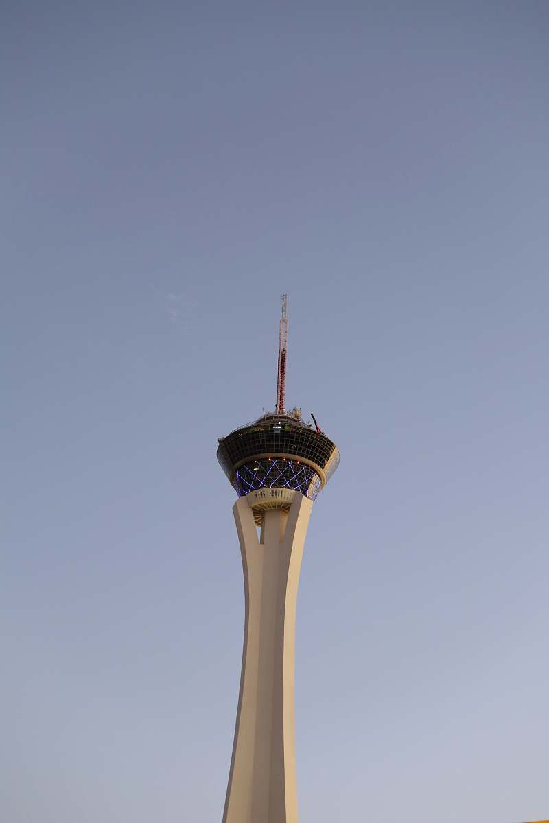 building white concrete tower under blue sky tower