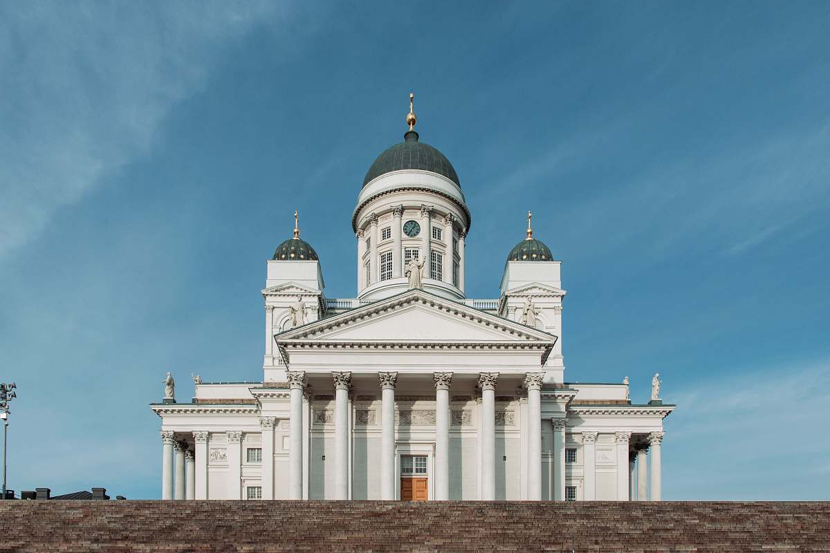 building white palace under cloudy sky dome