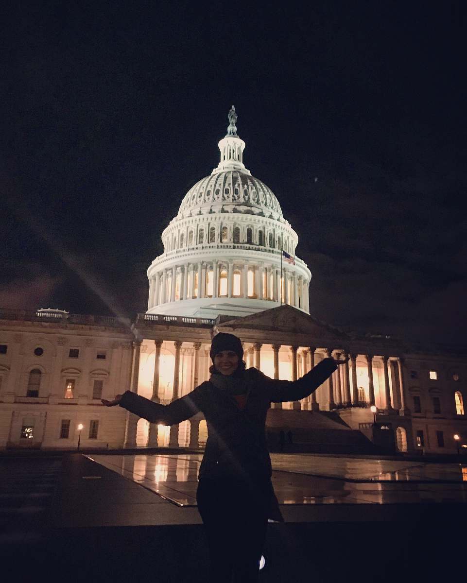 building woman standing near building dome