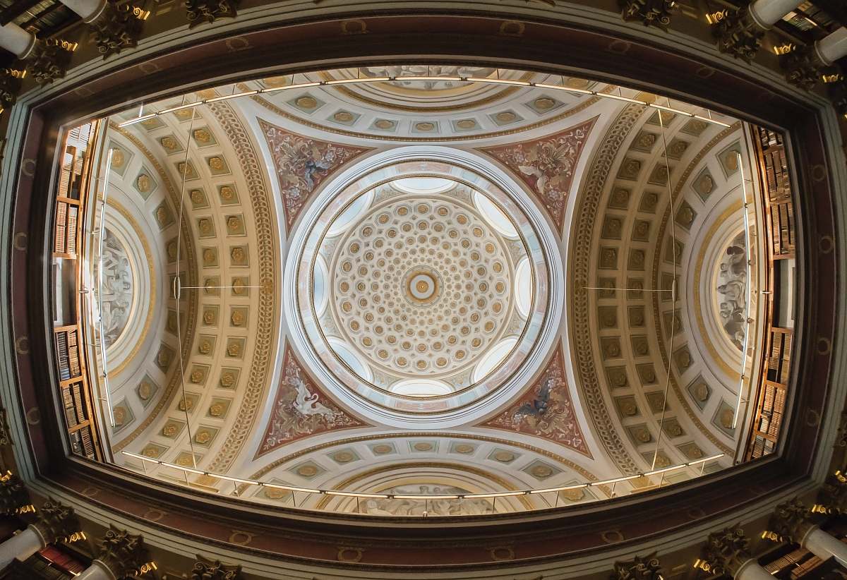 building worm eye view of artwork ceiling apse
