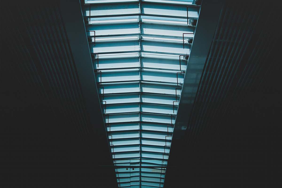 window worm's eye view photography of ceiling skylight