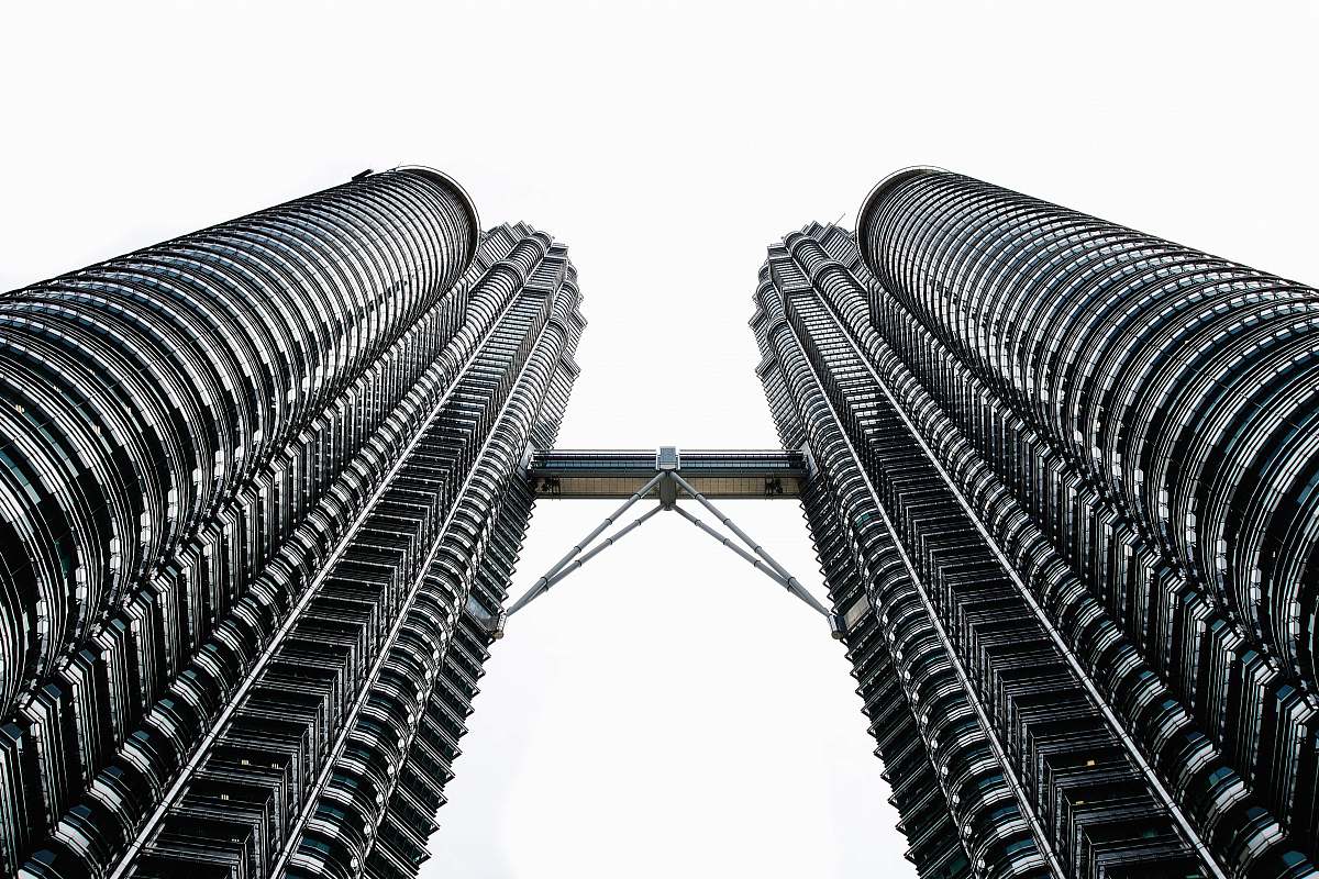 building worms eyeview photography of Petronas Tower during daytime urban