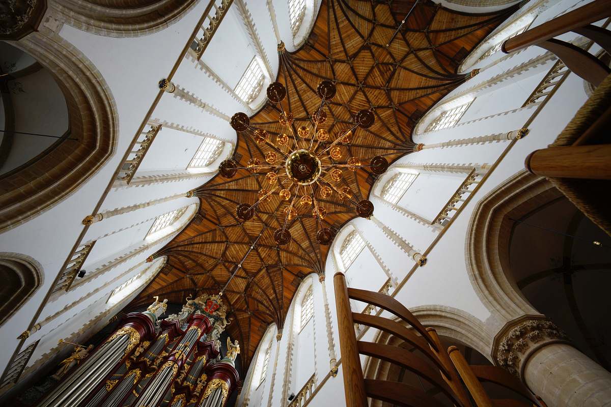 architecture arch entryways under brown ceiling banister