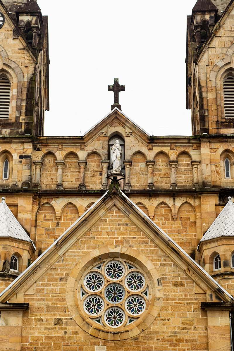tower architectural photography of brown cathedral steeple