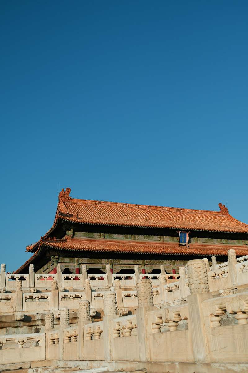 monastery brown and green pagoda house under a calm blue sky housing