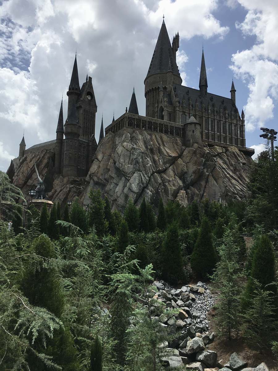architecture brown castle on rock spire