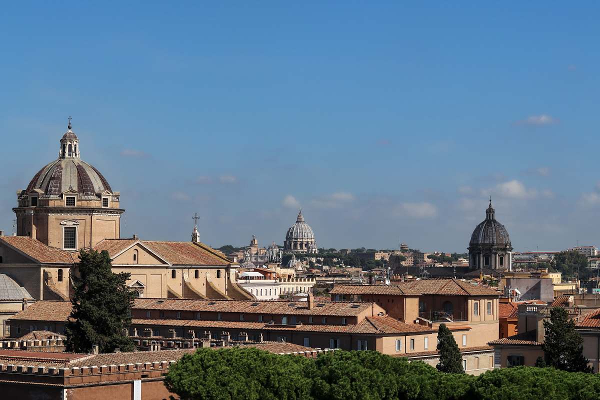 dome brown concrete buildings during daytime architecture