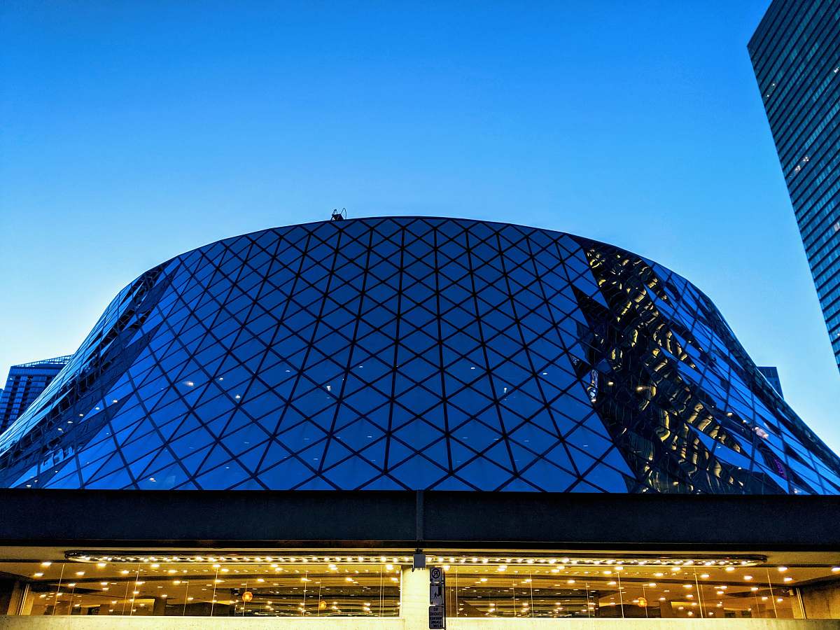 architecture gray and black metal and glass building planetarium
