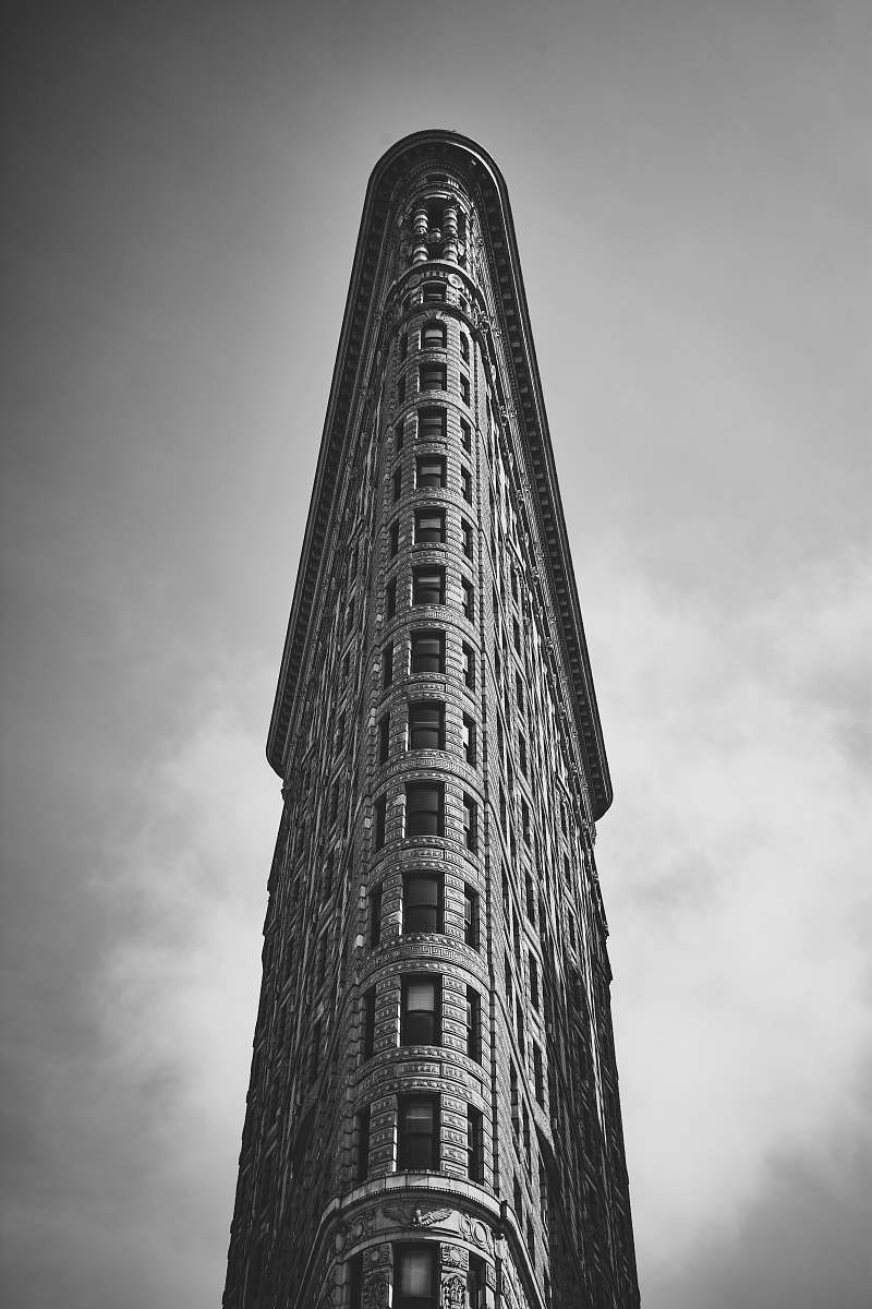 architecture gray high-rise building during daytime black-and-white