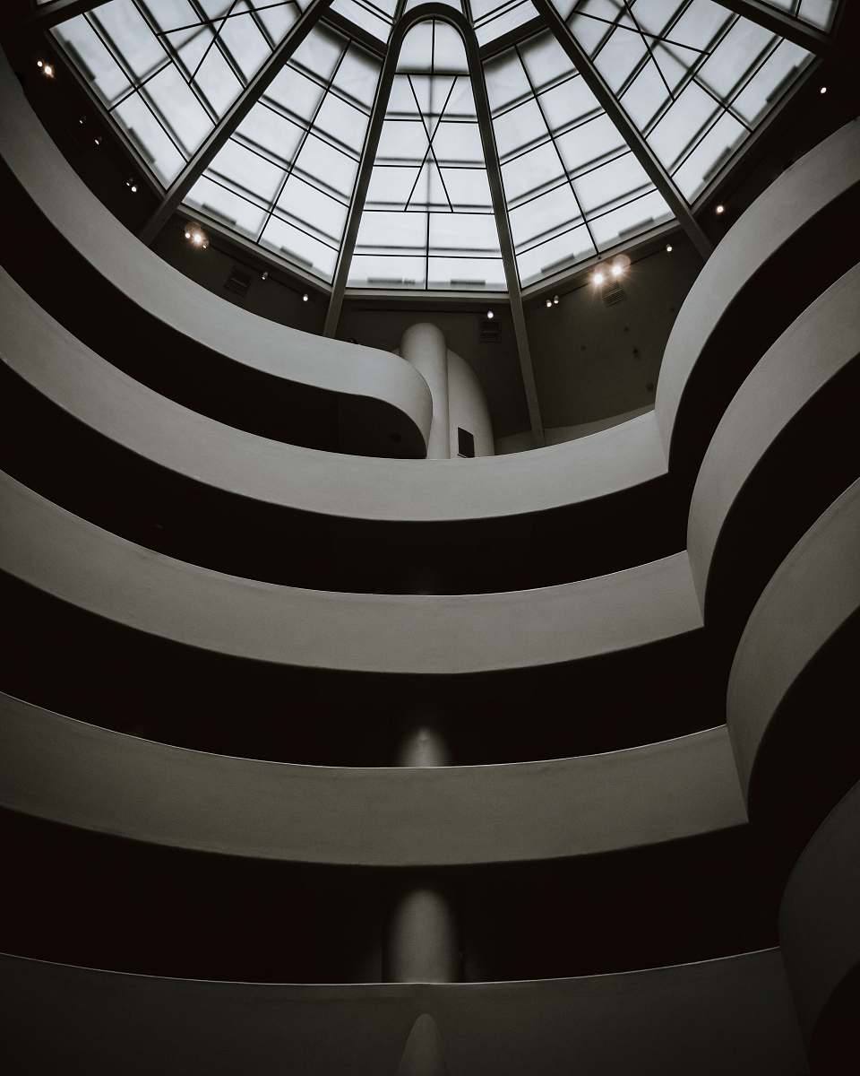architecture grayscale photo of building staircase