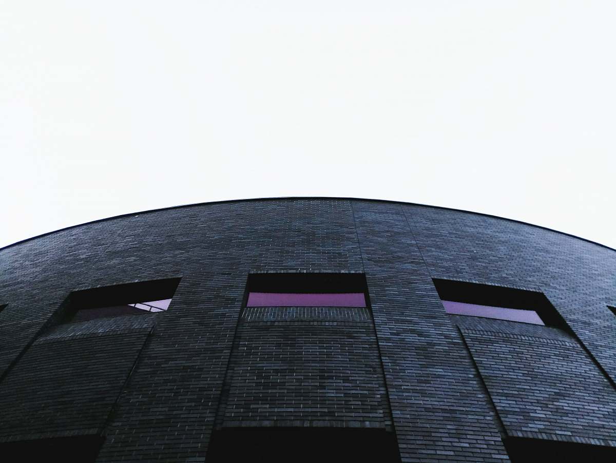architecture grey high rise building structure brick