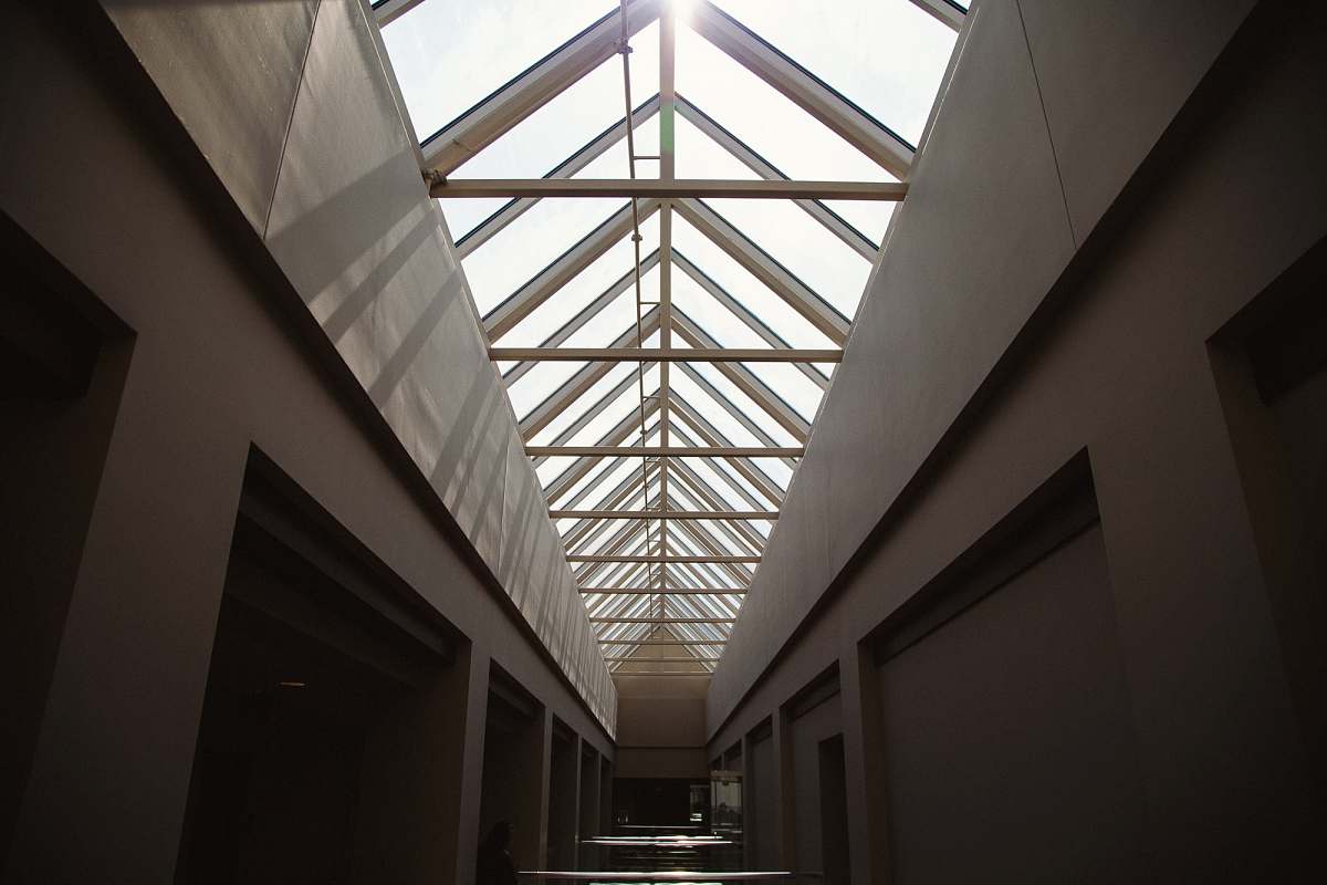 architecture landscape photography of white hallway skylight