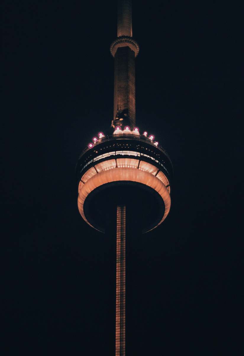 architecture low angle photo of lighted tower tower