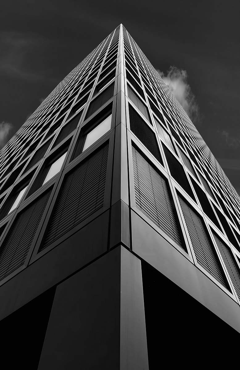 black-and-white low angle photography building skyscraper