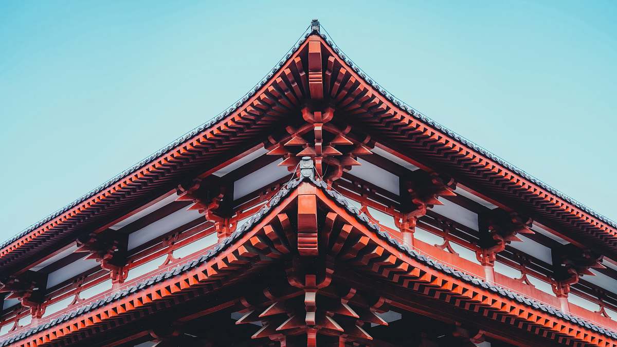 shrine low angle photography of brown building pagoda