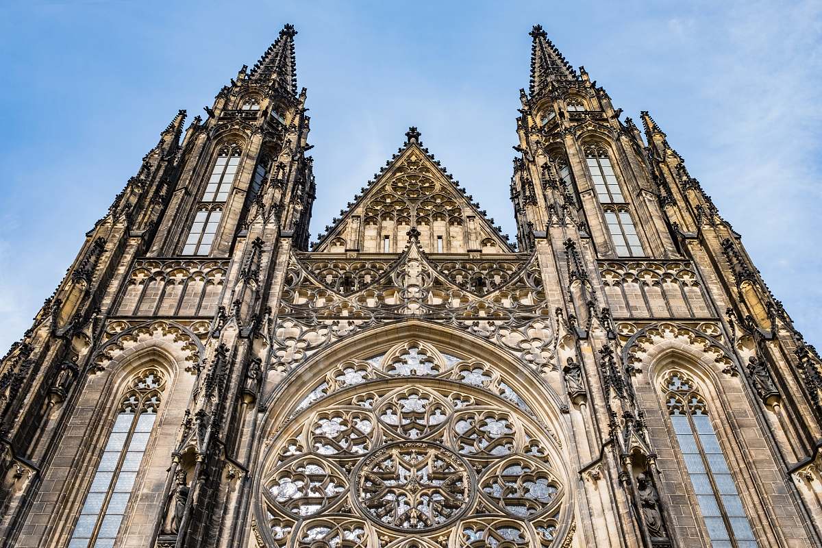 church low-angle photography of brown cathedral building cathedral
